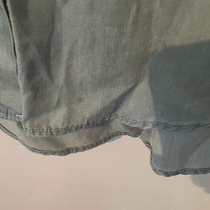 Top long sleeve it has a small stained at the bottom!